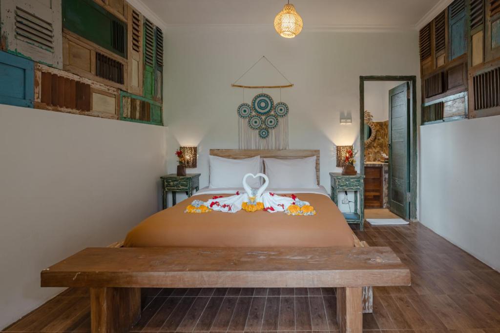Postel nebo postele na pokoji v ubytování Munduk Farmhouse