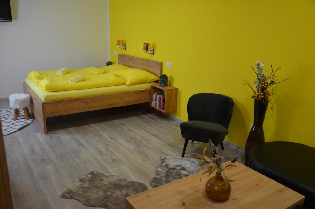 Postel nebo postele na pokoji v ubytování Apartmány Lukovské domečky