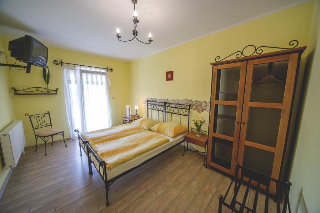 Postel nebo postele na pokoji v ubytování Penzion El Camino