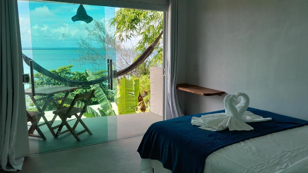 Voodi või voodid majutusasutuse Monkey beach agroturismo toas