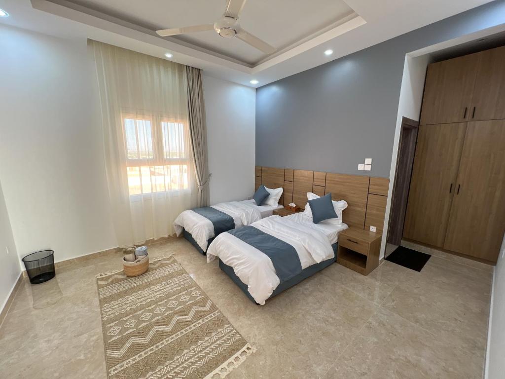 Postel nebo postele na pokoji v ubytování R61 Sunrise Chalet
