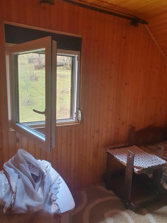 a room with a window and a table in it at Nikša apartment in Pljevlja