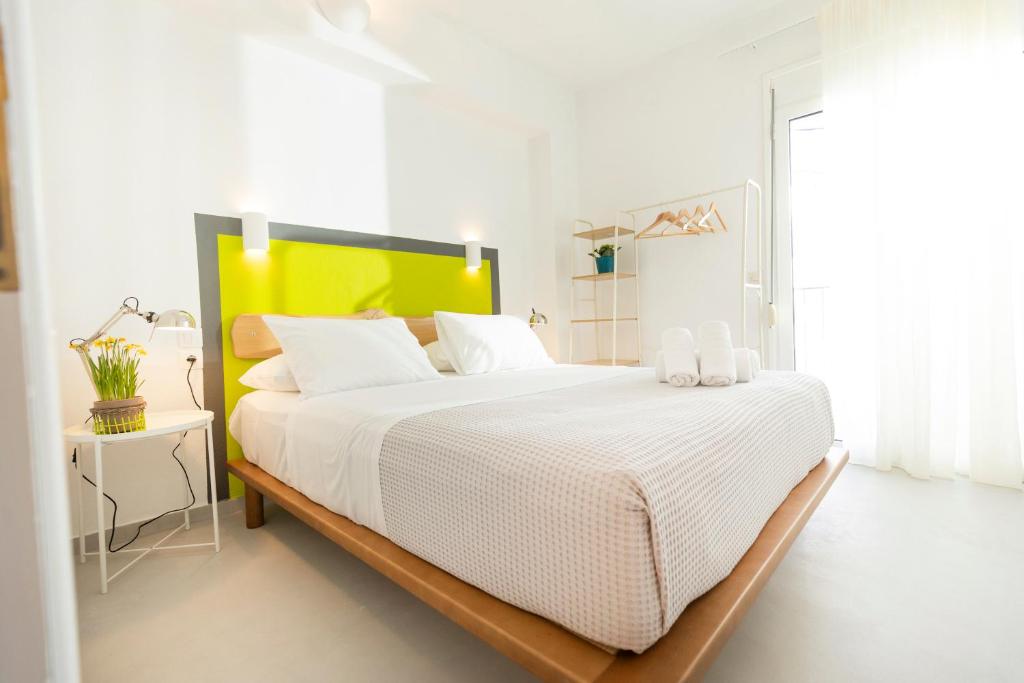Postel nebo postele na pokoji v ubytování KIMIA Guest House