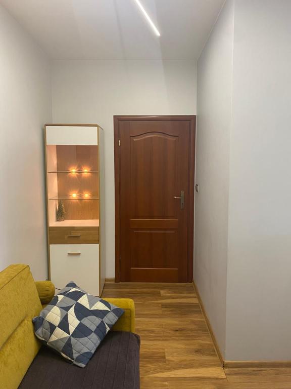 Coin salon dans l'établissement Apartament Blisko Centrum