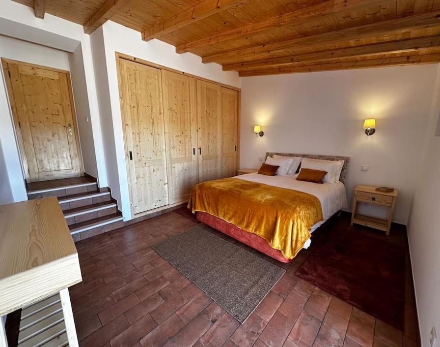 Postel nebo postele na pokoji v ubytování Monte da Caniveta - Casa do Avô