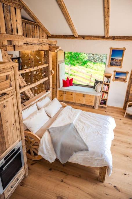 Postel nebo postele na pokoji v ubytování Unterkircher Chalet