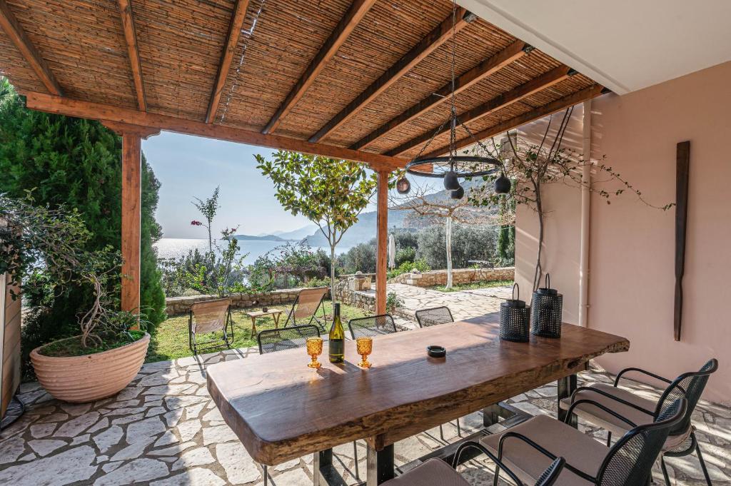 Zahrada ubytování Paralio Astros Beachfront Suites