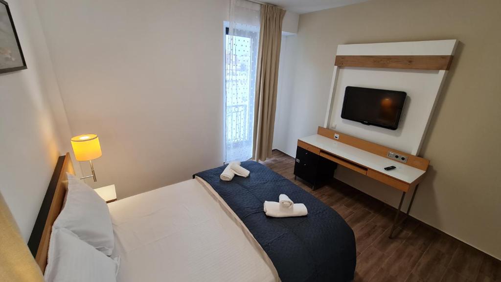 Postel nebo postele na pokoji v ubytování Jafar Resort 4
