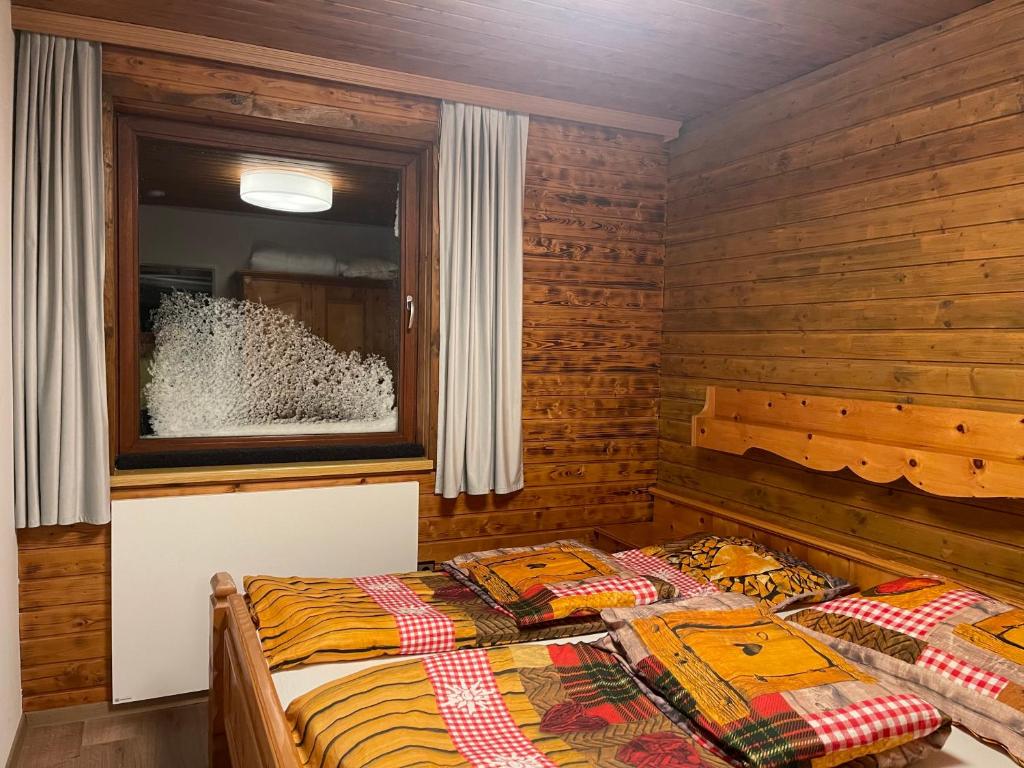 Postel nebo postele na pokoji v ubytování Almhaus-Klippitz