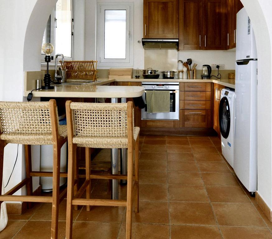 Kuchyň nebo kuchyňský kout v ubytování Villa Aura - Villa in Peyia