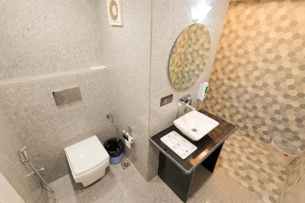 Koupelna v ubytování Hotel Ganga Ratan