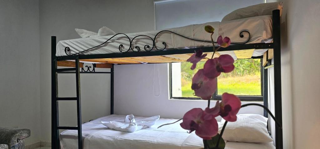 Cama o camas de una habitación en Cabañas Cafeteras Cerritos