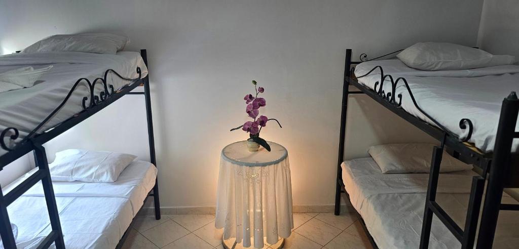 Cama o camas de una habitación en Cabañas Cafeteras Cerritos