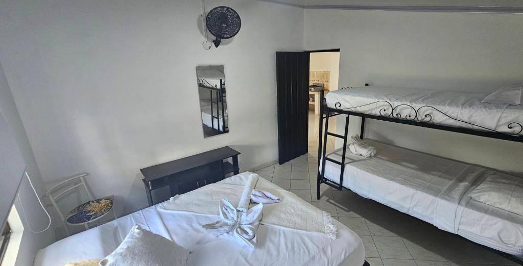 Cama o camas de una habitación en Cabañas Cafeteras Cerritos