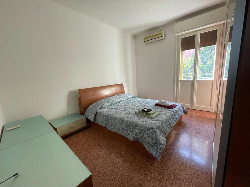 מיטה או מיטות בחדר ב-Cristoforo