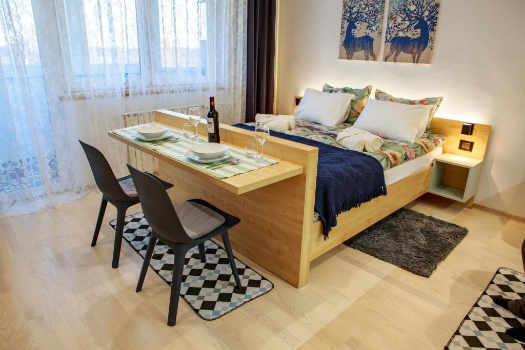 Postel nebo postele na pokoji v ubytování Studio apartman D7