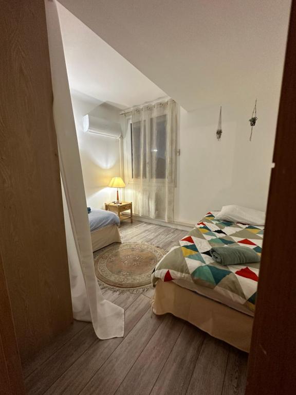 Posteľ alebo postele v izbe v ubytovaní Appt lumineux et spacieux au cœur de Cannes