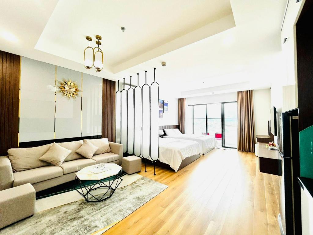 Postel nebo postele na pokoji v ubytování Căn Hộ TMS View Biển Quy Nhơn