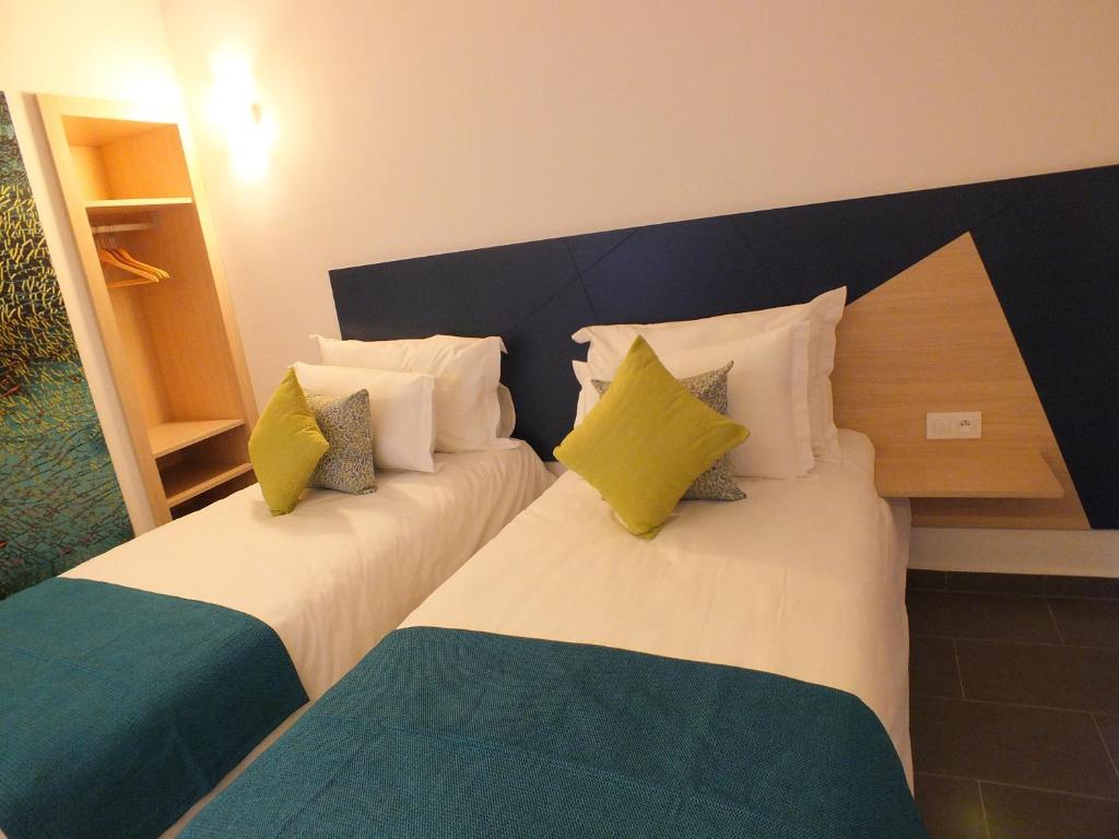 Postel nebo postele na pokoji v ubytování Hotel Relax Marrakech