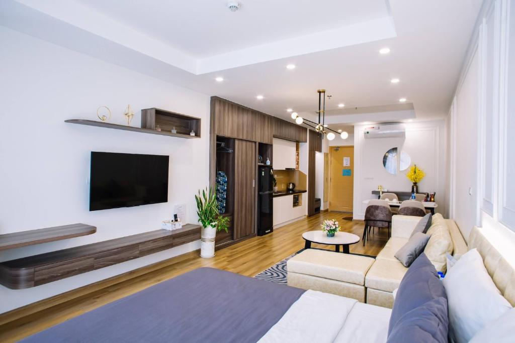 TV a/nebo společenská místnost v ubytování Căn Hộ TMS View Biển Quy Nhơn