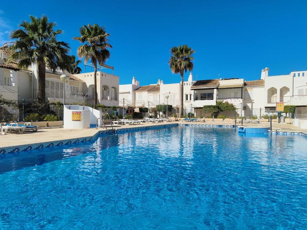 The swimming pool at or close to Medina Marinas - Tú hogar con solarium privado!