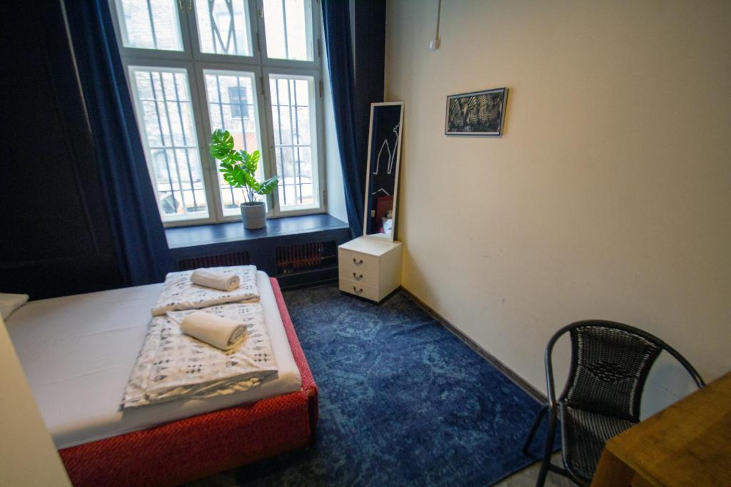 Postel nebo postele na pokoji v ubytování Imaginary Hostel