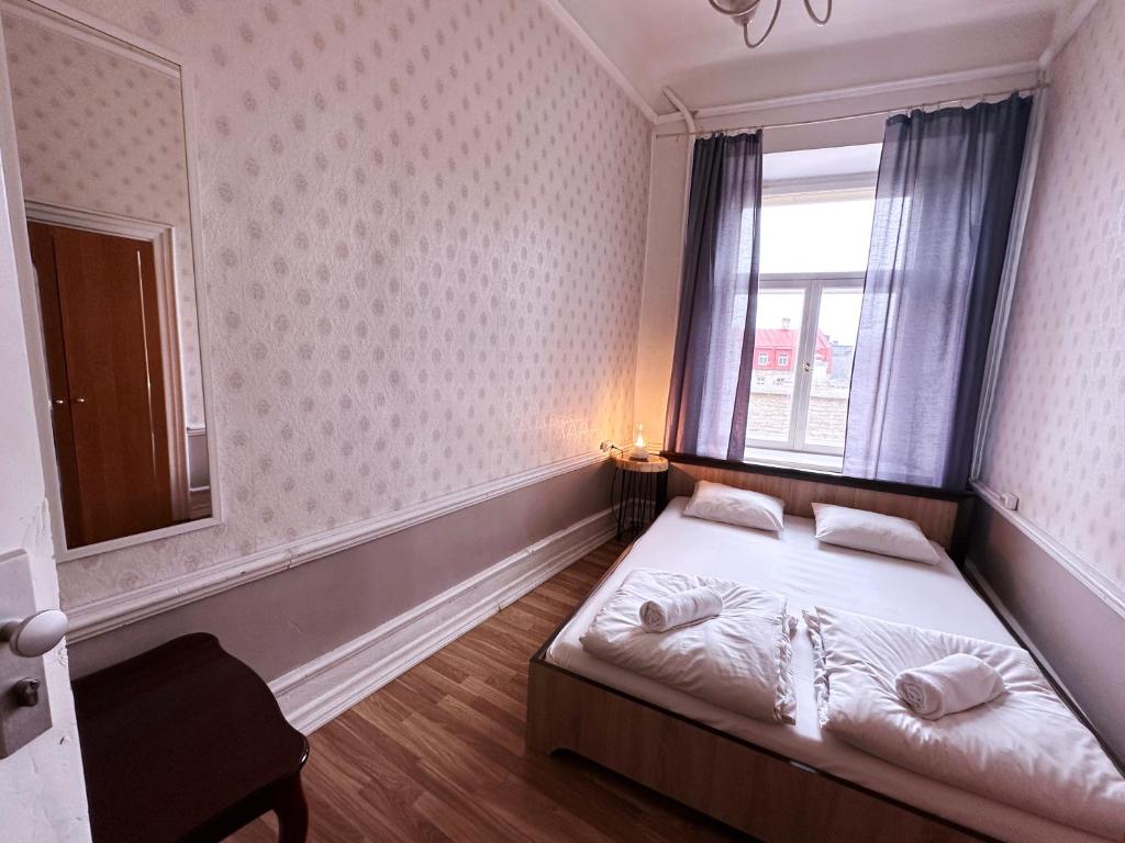 Postel nebo postele na pokoji v ubytování Imaginary Hostel