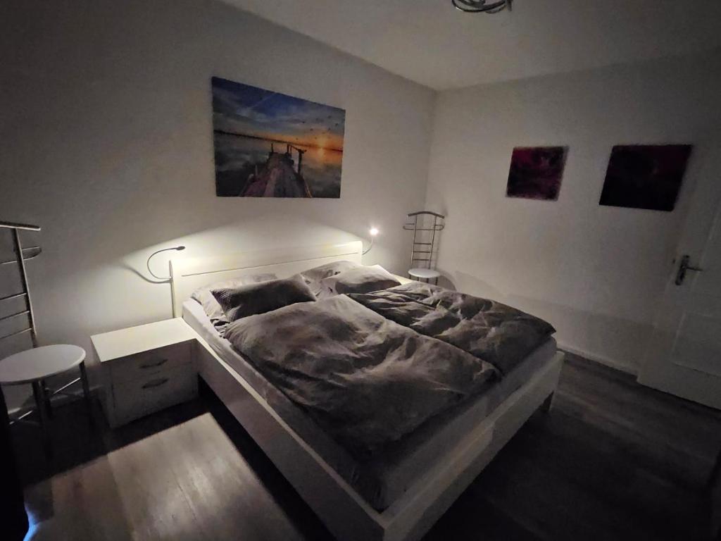 Postel nebo postele na pokoji v ubytování Strandallee 150a