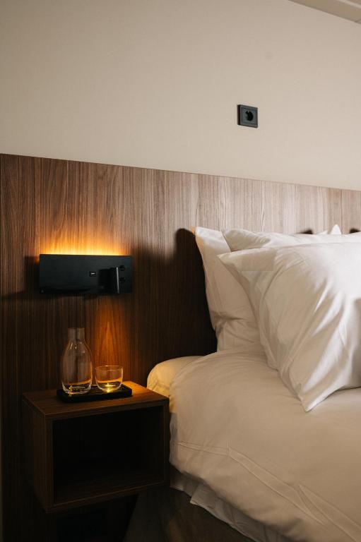 Postel nebo postele na pokoji v ubytování Hotel Blink