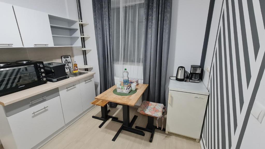 Kuchyň nebo kuchyňský kout v ubytování Pomiculturii Residence 3