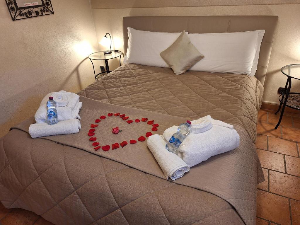 Postel nebo postele na pokoji v ubytování GIRASOLE Wellness e Relax