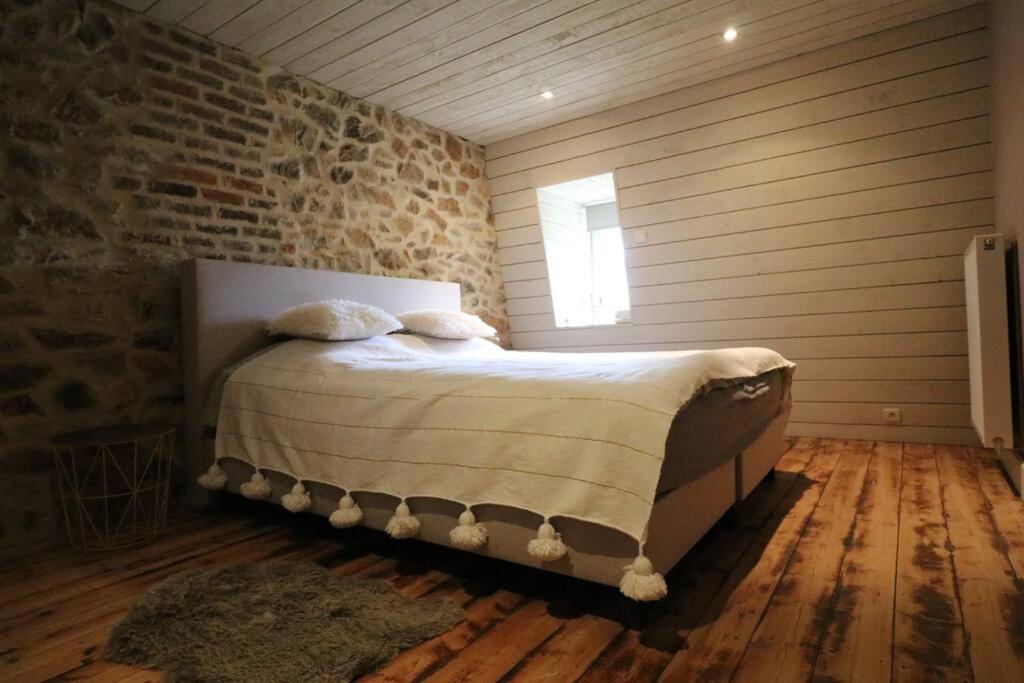 Postel nebo postele na pokoji v ubytování Clos des Rogations