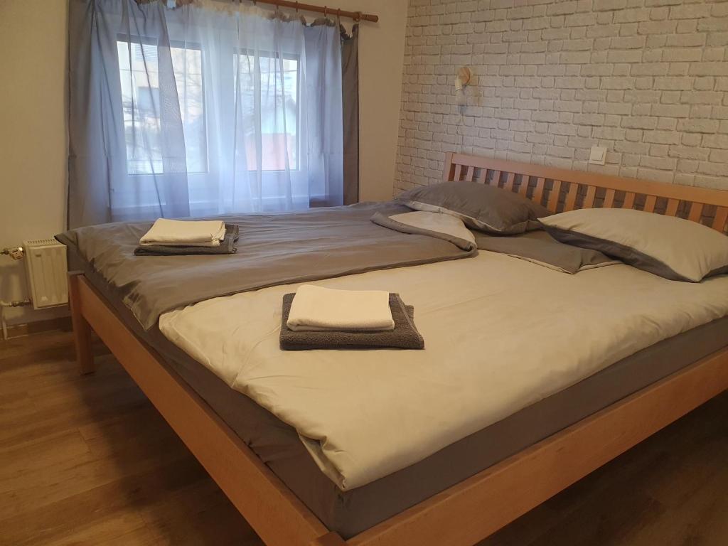 Postel nebo postele na pokoji v ubytování Pension TTT