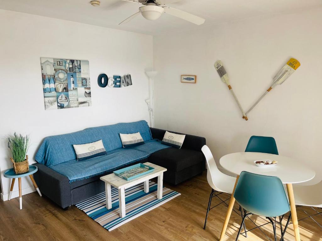 Posezení v ubytování Precioso apartamento piscinas Cala en Porter