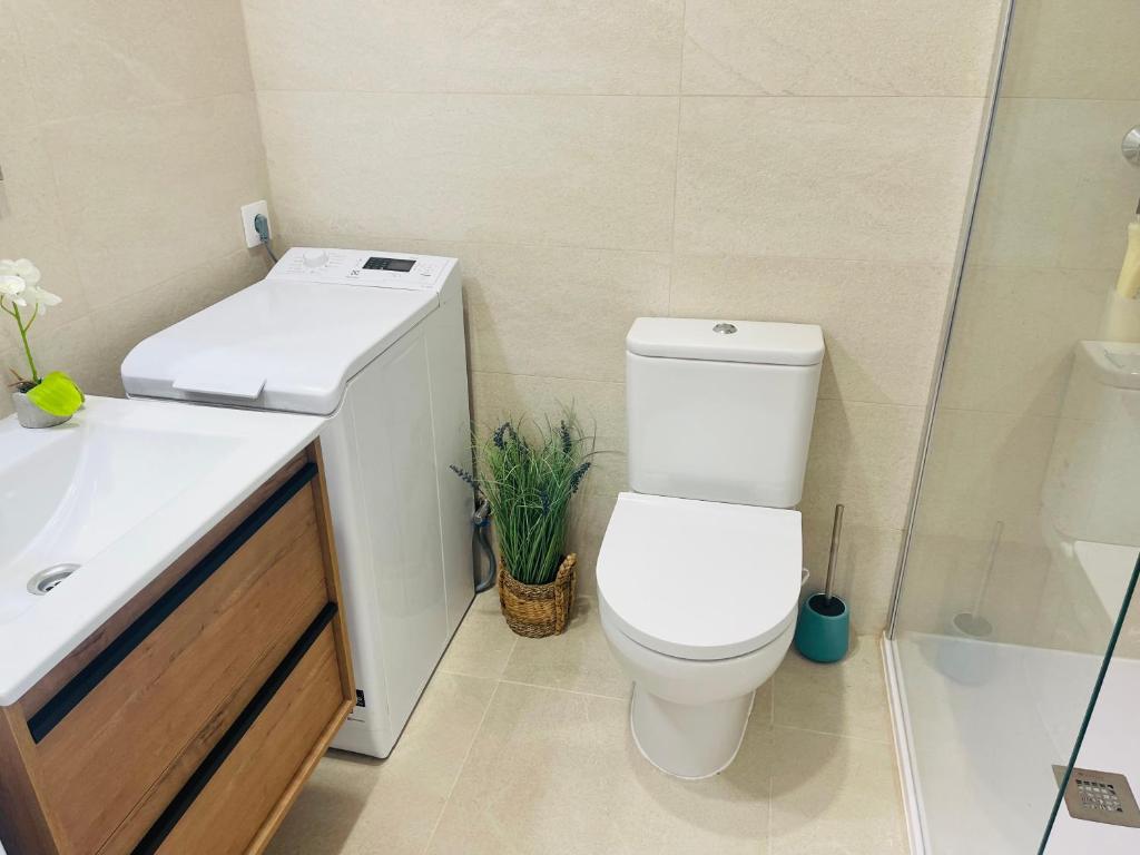 Koupelna v ubytování Precioso apartamento piscinas Cala en Porter