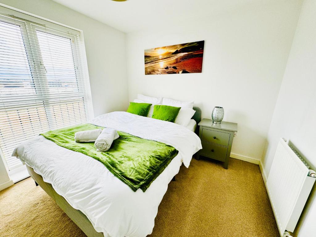 Postel nebo postele na pokoji v ubytování Modern 2-Bedroom Apartment