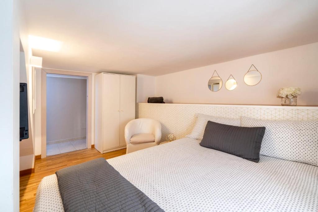 Postel nebo postele na pokoji v ubytování Cesarotti B&B