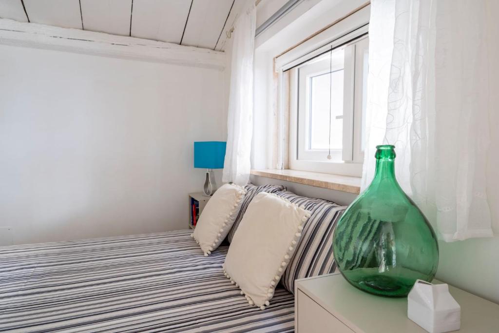 Postel nebo postele na pokoji v ubytování Cesarotti B&B