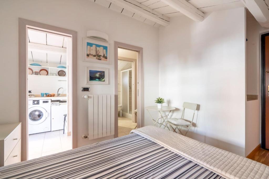 Postel nebo postele na pokoji v ubytování Cesarotti B&B