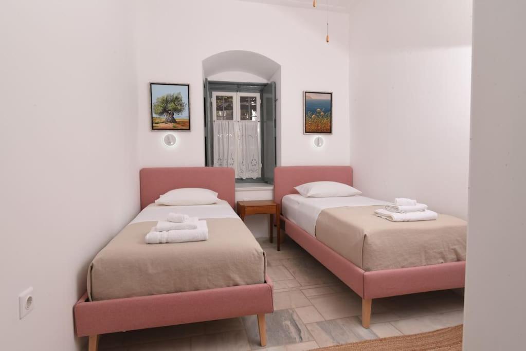 Postel nebo postele na pokoji v ubytování Mansion Veranda