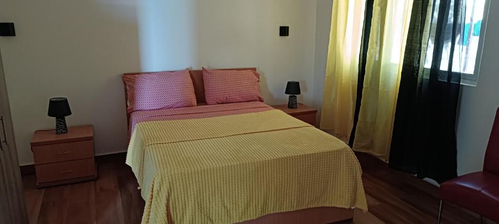 Postel nebo postele na pokoji v ubytování Residência Águia