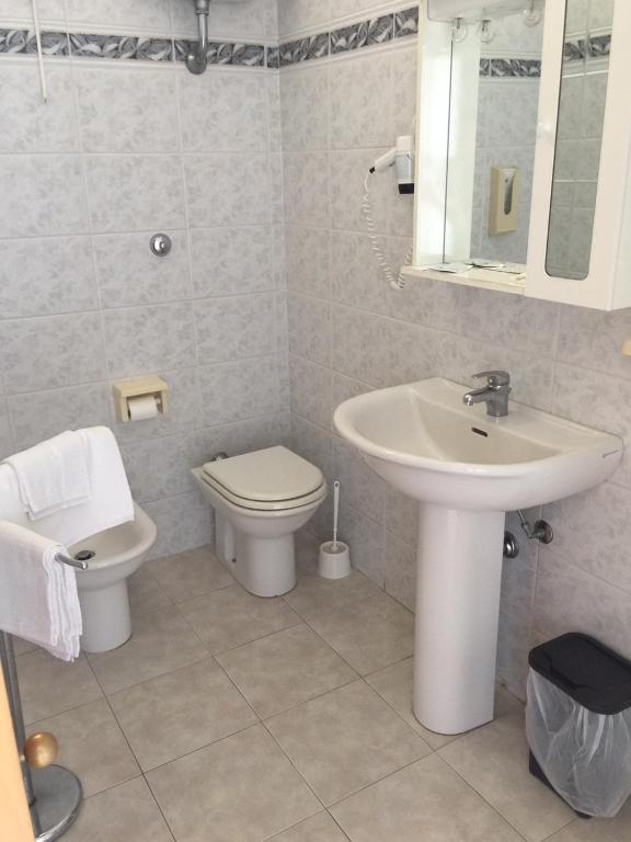 Koupelna v ubytování Hotel Lido