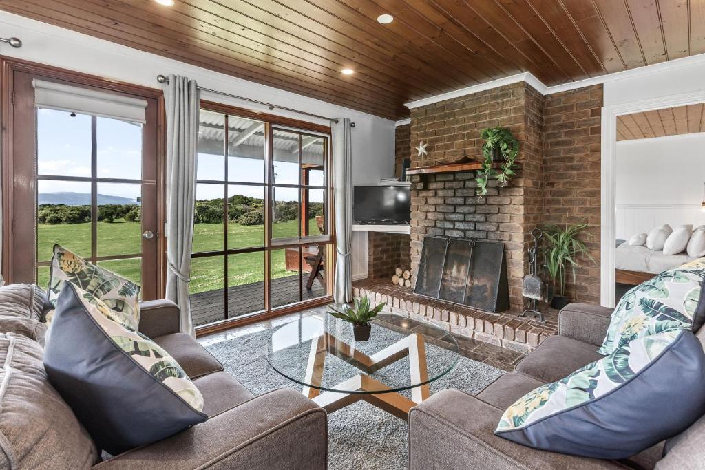 Posezení v ubytování Apollo Bay Cottages- Marriners