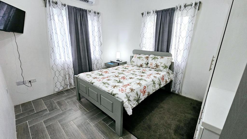 Postel nebo postele na pokoji v ubytování Ihola's Nest
