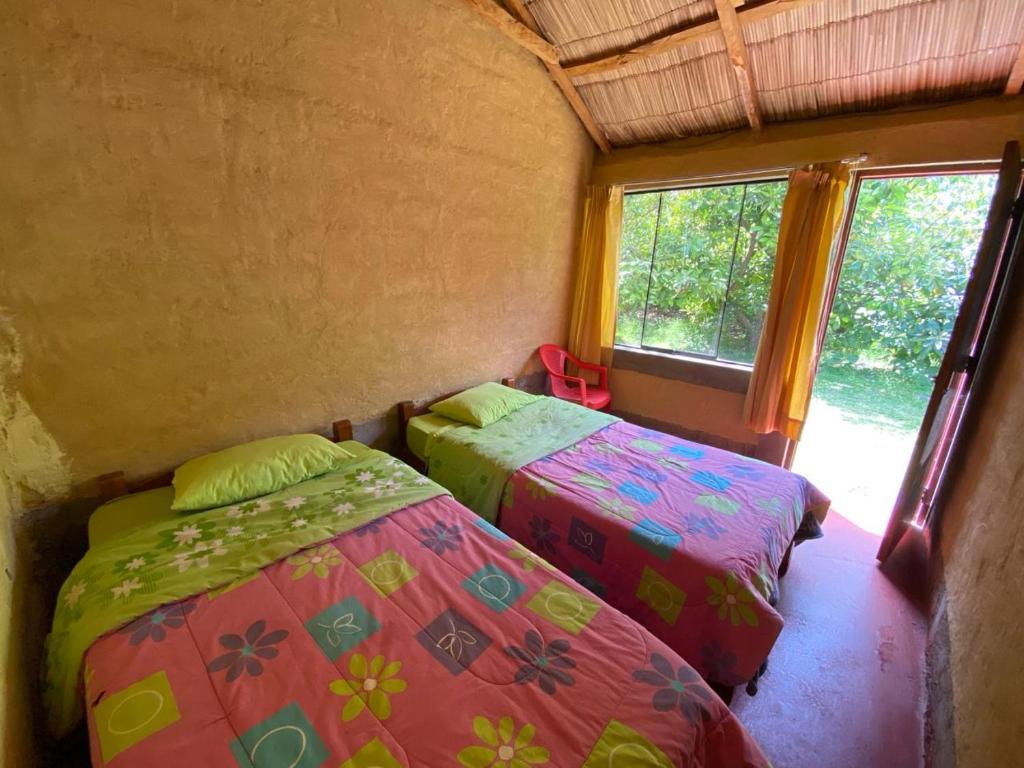 Postel nebo postele na pokoji v ubytování Posada Gloria