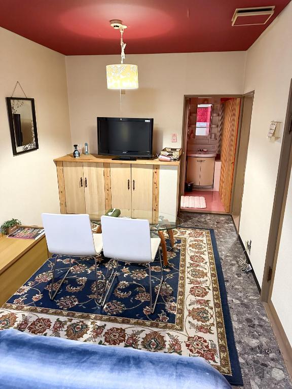 TV a/nebo společenská místnost v ubytování Hotel Rakusai