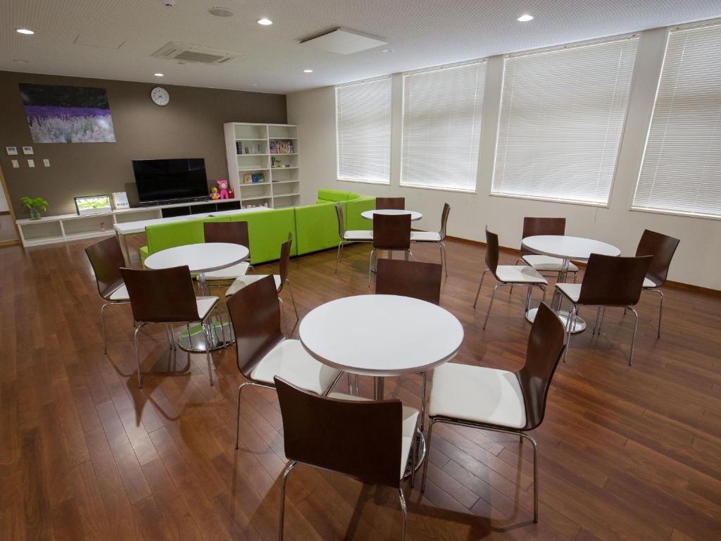 TV a/nebo společenská místnost v ubytování Misato Town Community Lodge Wakuasu