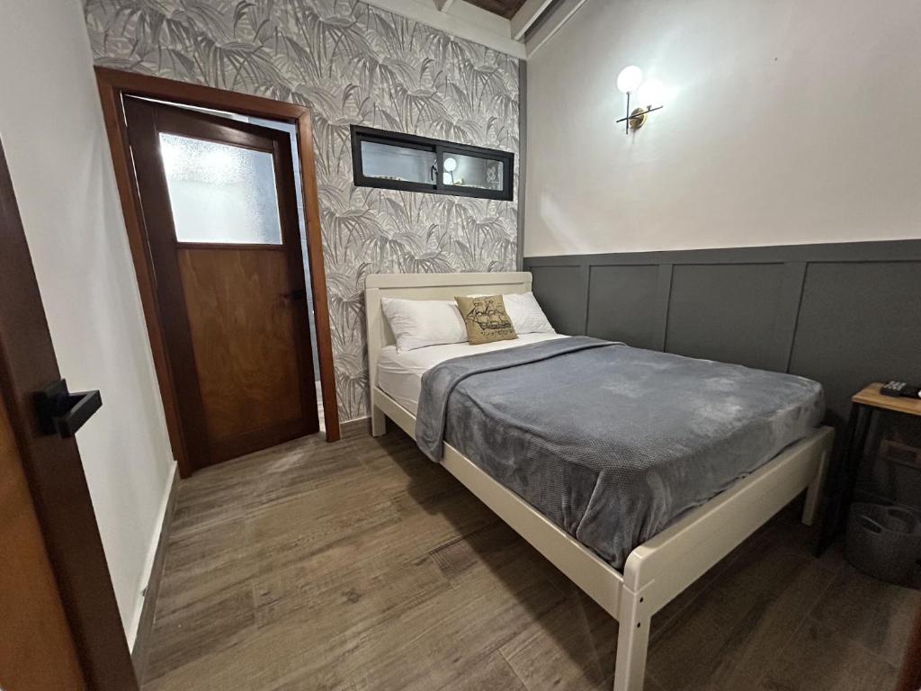Postel nebo postele na pokoji v ubytování Beach Apartment Villas Jubey, Emotion access