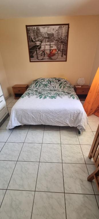 Postel nebo postele na pokoji v ubytování CHEZ LILIANE