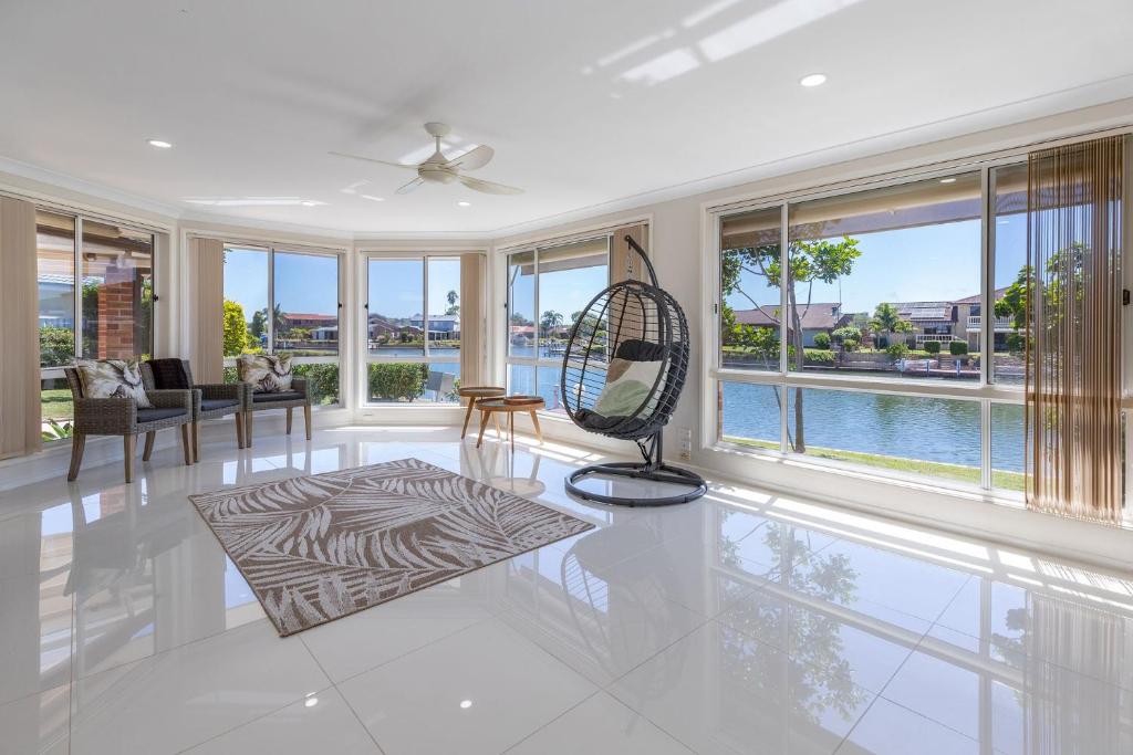 a living room with a view of the water at 114 Elizabeth Pde in Forster
